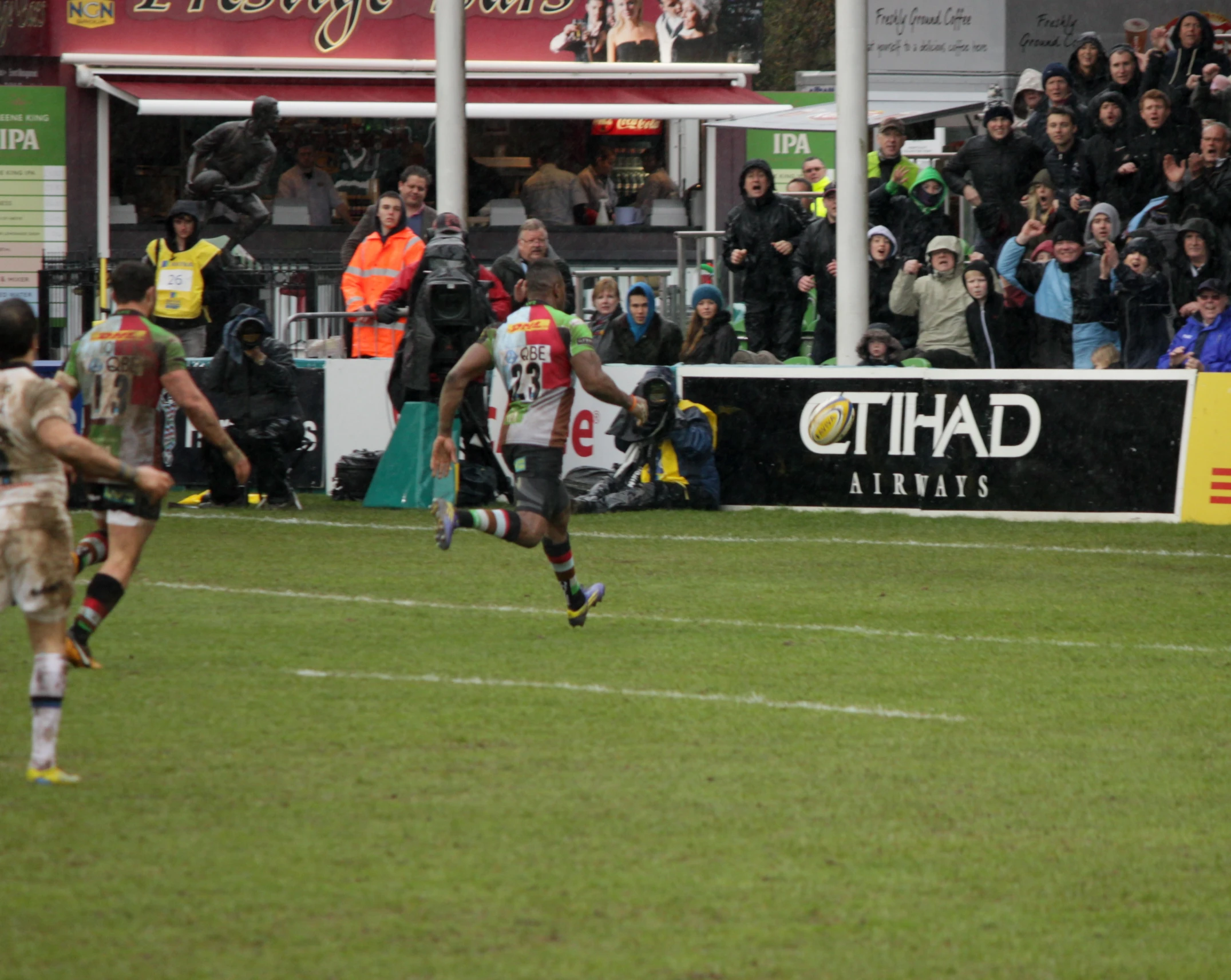 soccer player in action on the field playing a game