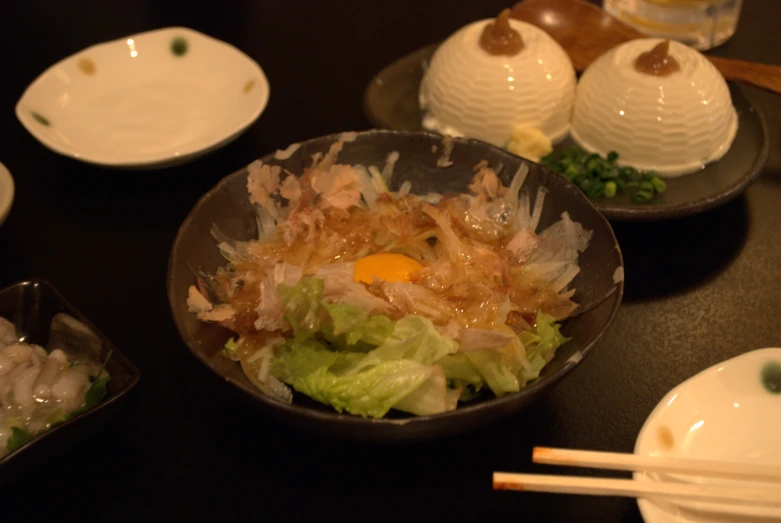 a dish with meat on it sits in a restaurant