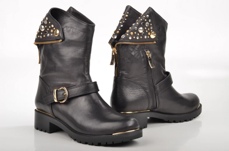 the boots are black and have golden chains