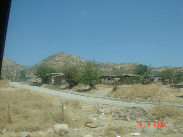 an image of a road with a lot of dirt