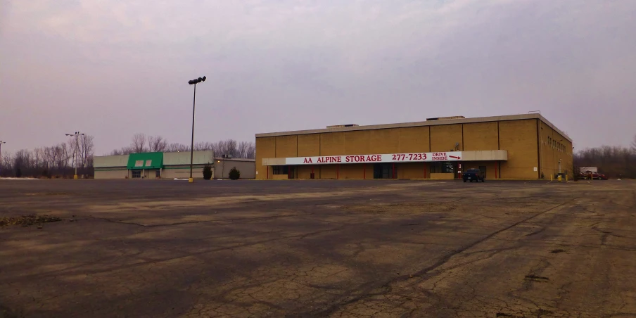 a deserted parking lot in a retail center