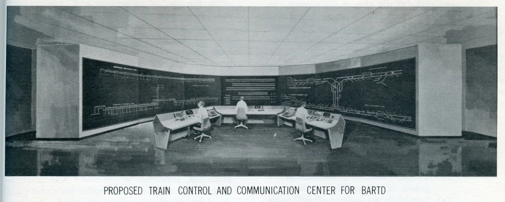 an old picture of an office with two people at the front