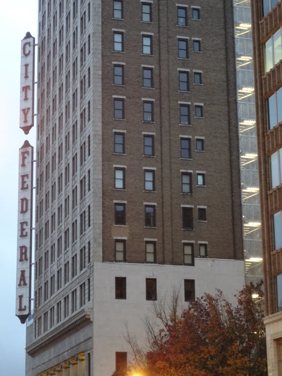 a big building with a lit up sign on top