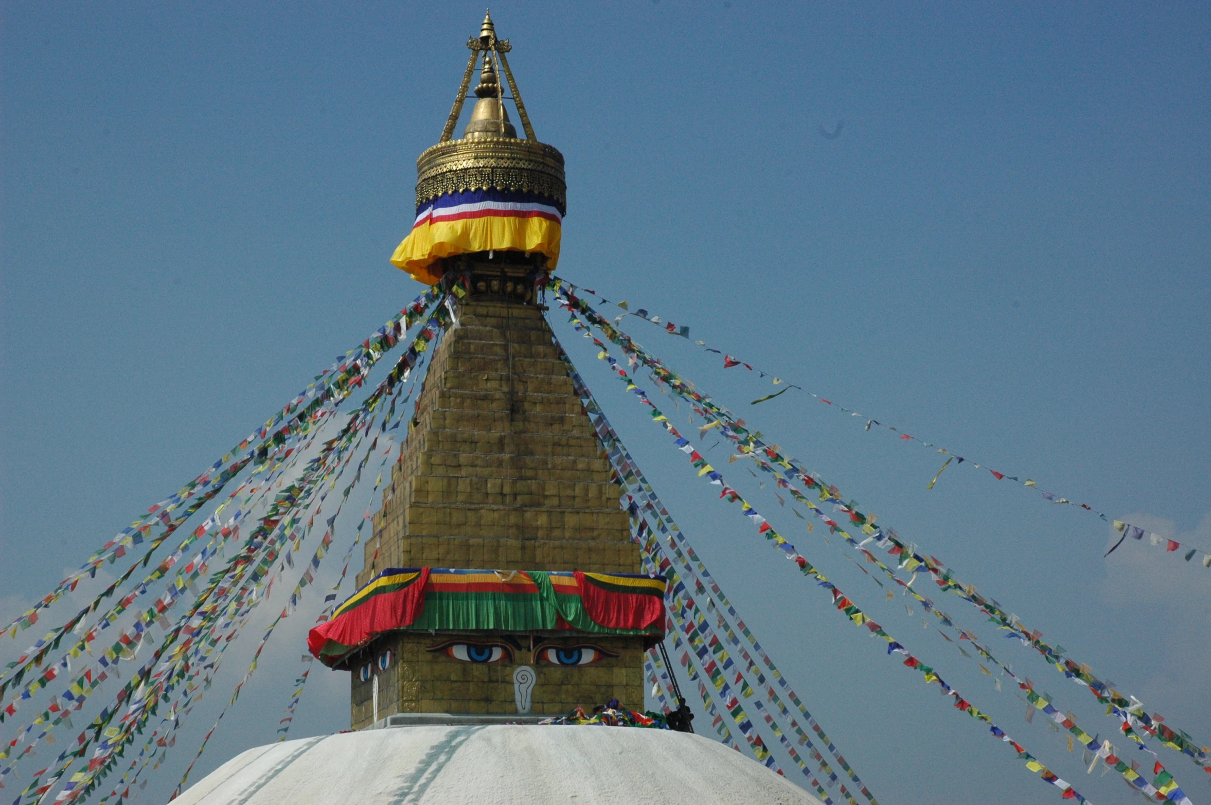 a very tall tower with some strings around it