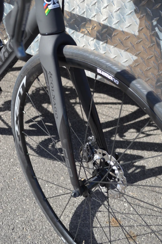 a closeup of a bicycle wheel with the front ke