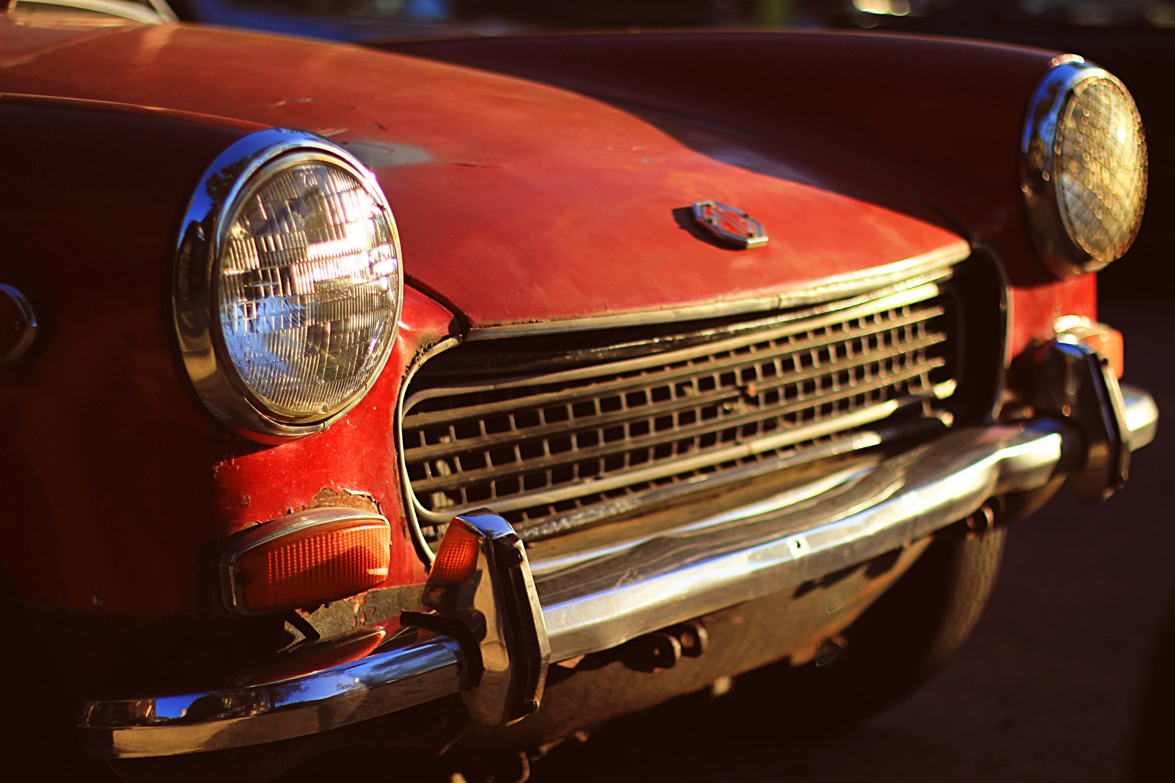 close up of the front end of an old car