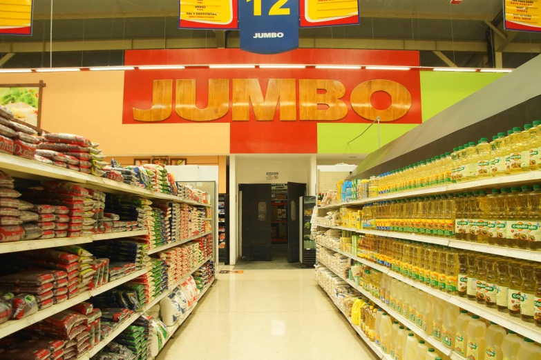 an aisle of different products labeled jumbo and other foods