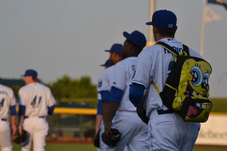 the baseball players are getting ready to play