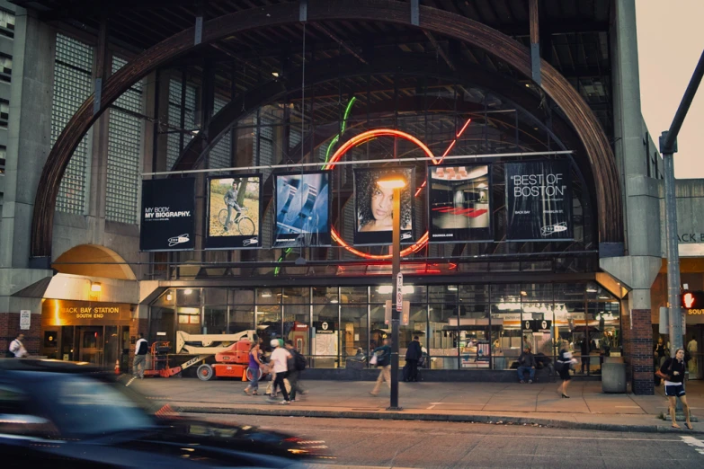 a traffic circle in the city with people walking