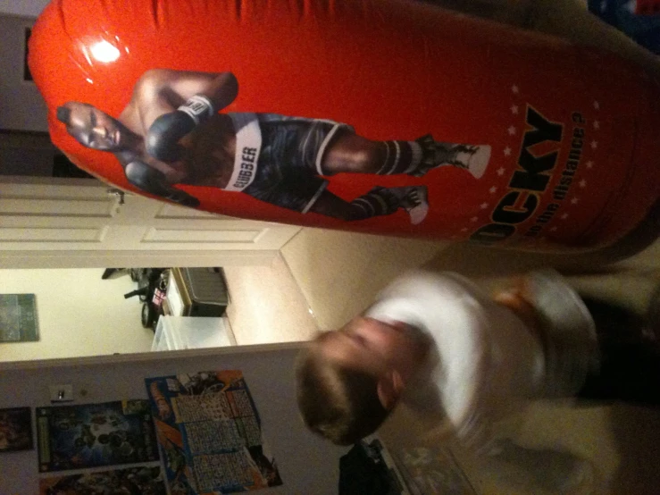 there is an inflatable object that looks like a boxing punching glove