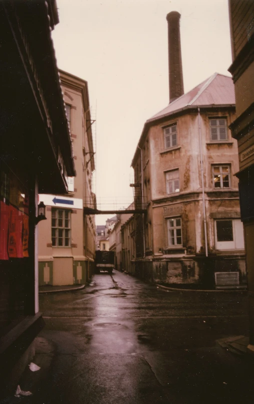 an old po with street with fire hydrant in background