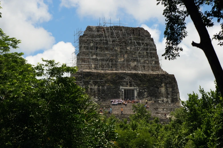 the tower in the distance is made from stone