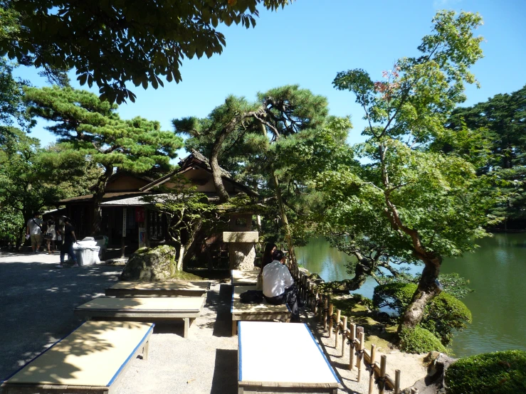 there is some benches and a bench along the river