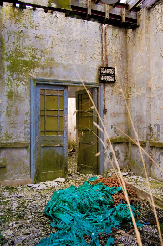 a pile of garbage in an old building