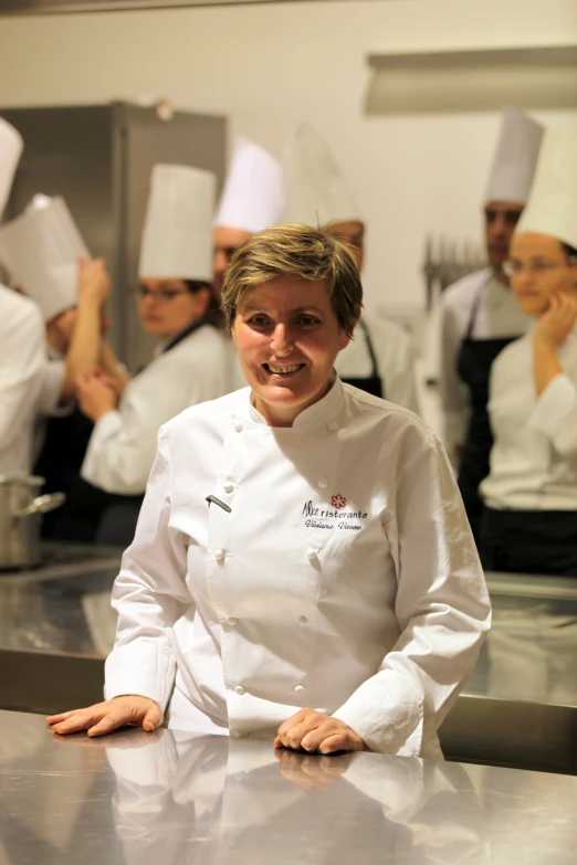 a group of chefs standing next to each other