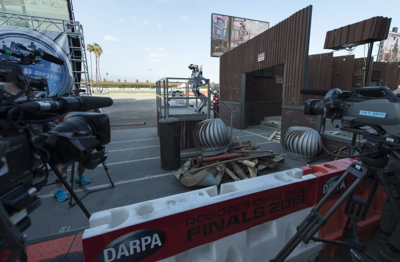 a lot of films sitting outside of a building