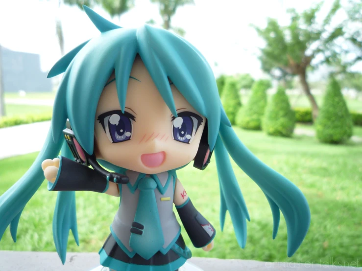 a cute figure of an anime girl with blue hair