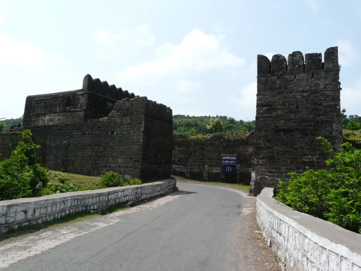 the old, crumbling brick buildings have been built on top of the road