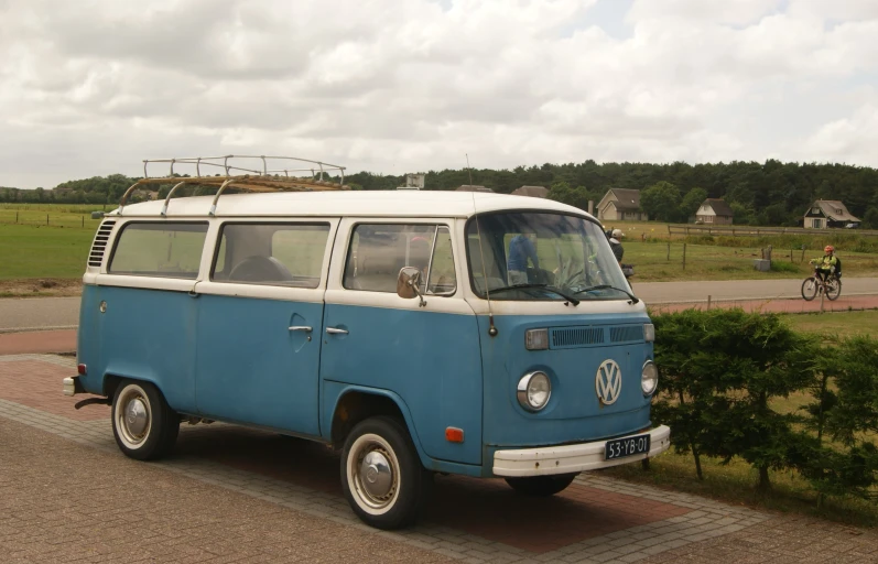 a vintage vw van parked on a street