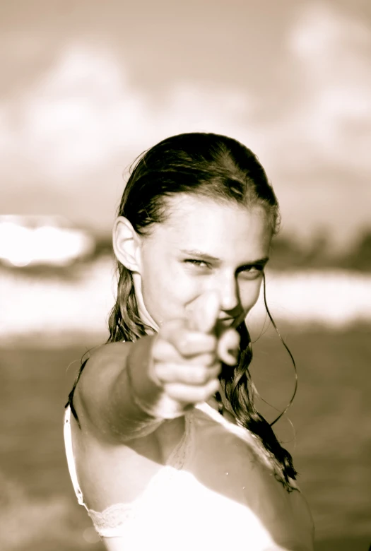 an image of a girl pointing at soing