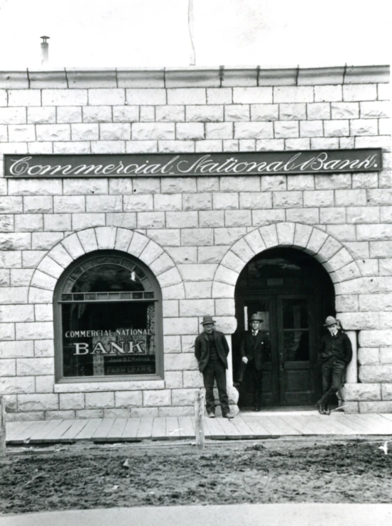 an old po of some men on the steps outside