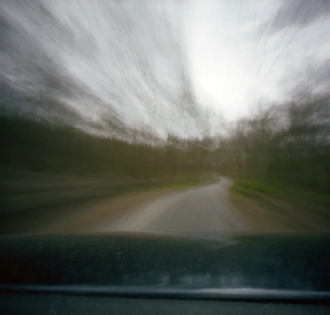 the view from inside a vehicle of a blurry po