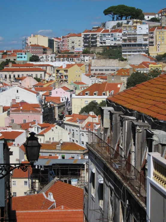 red tiled rooftops are shown as seen from above