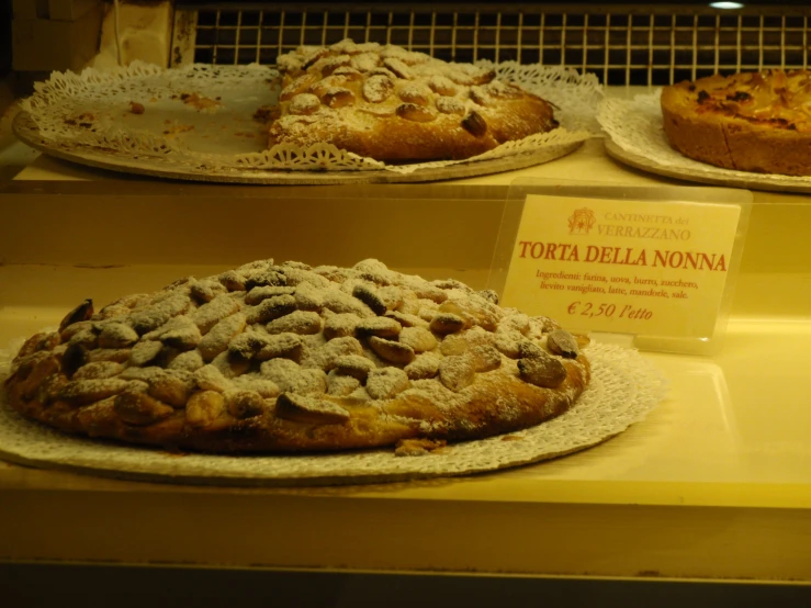 a display case at a bakery with baked goods for sale