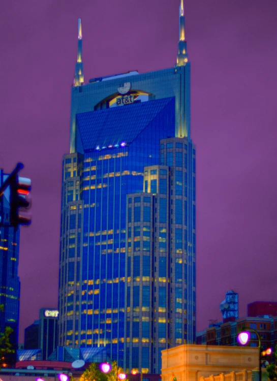 an image of city at night with traffic lights