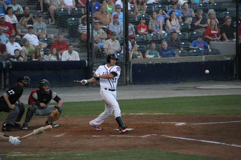 baseball player preparing to hit a ball during a game