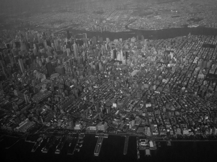 an aerial view of the cityscape from a plane