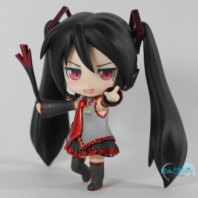 a girl with long black hair wearing black boots and red eye makeup