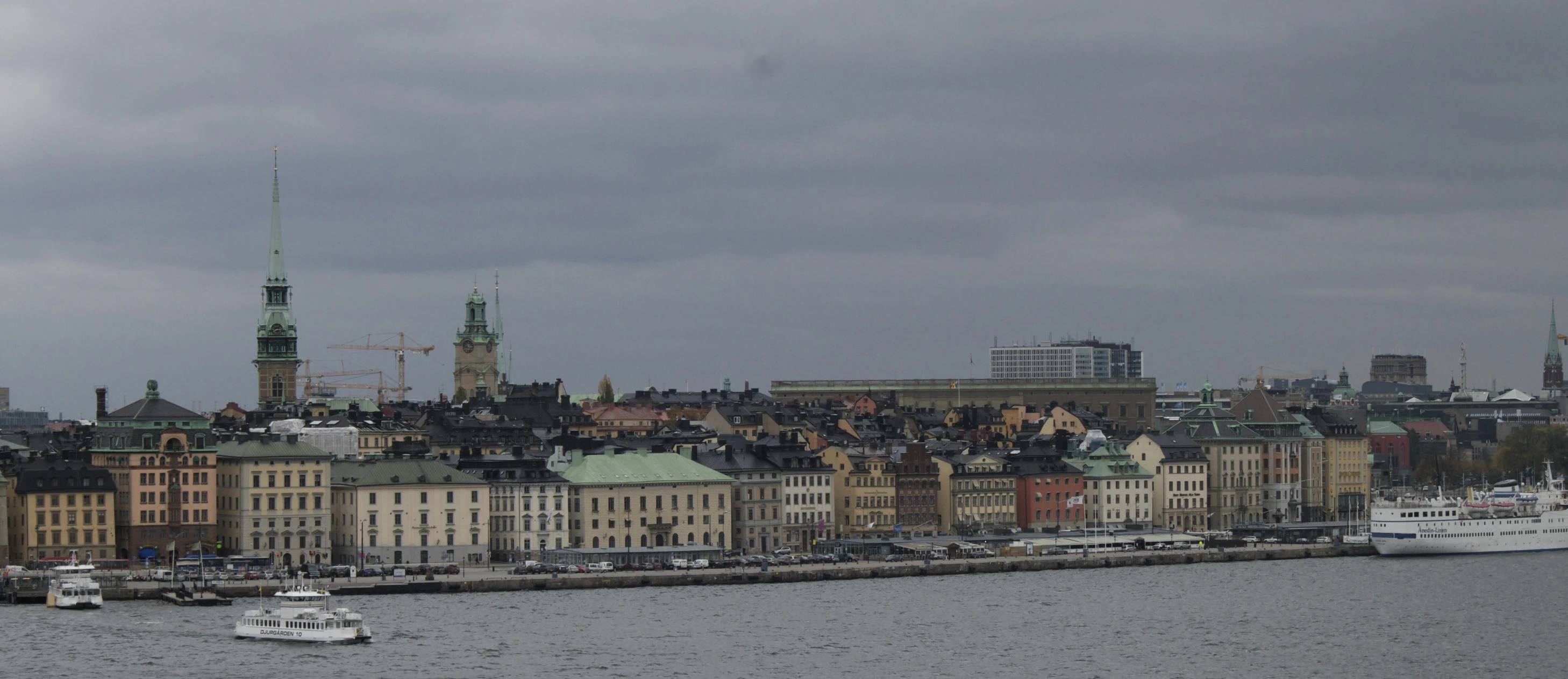 large city with tall buildings on the waterfront