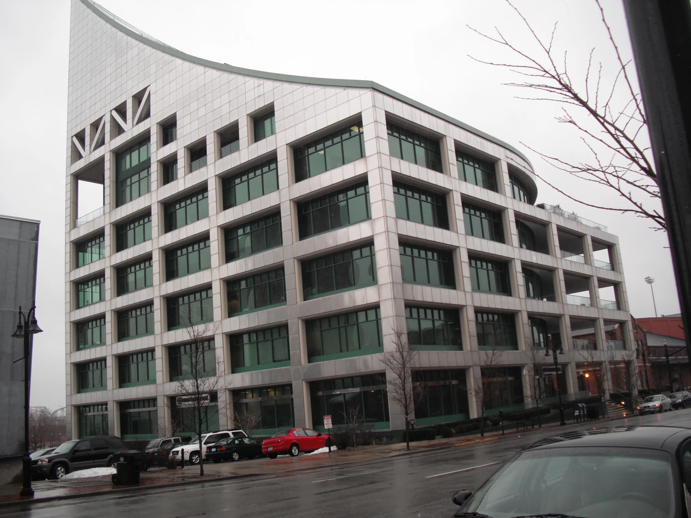 a tall office building that has many windows