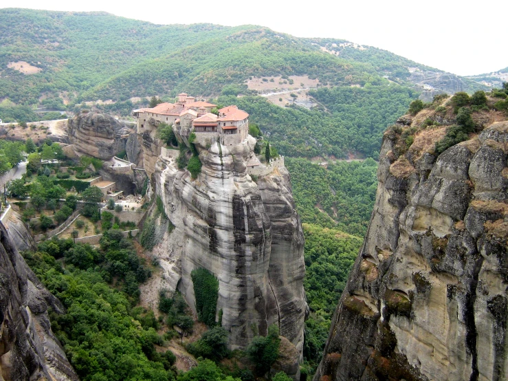 an aerial view of a very large rock castle