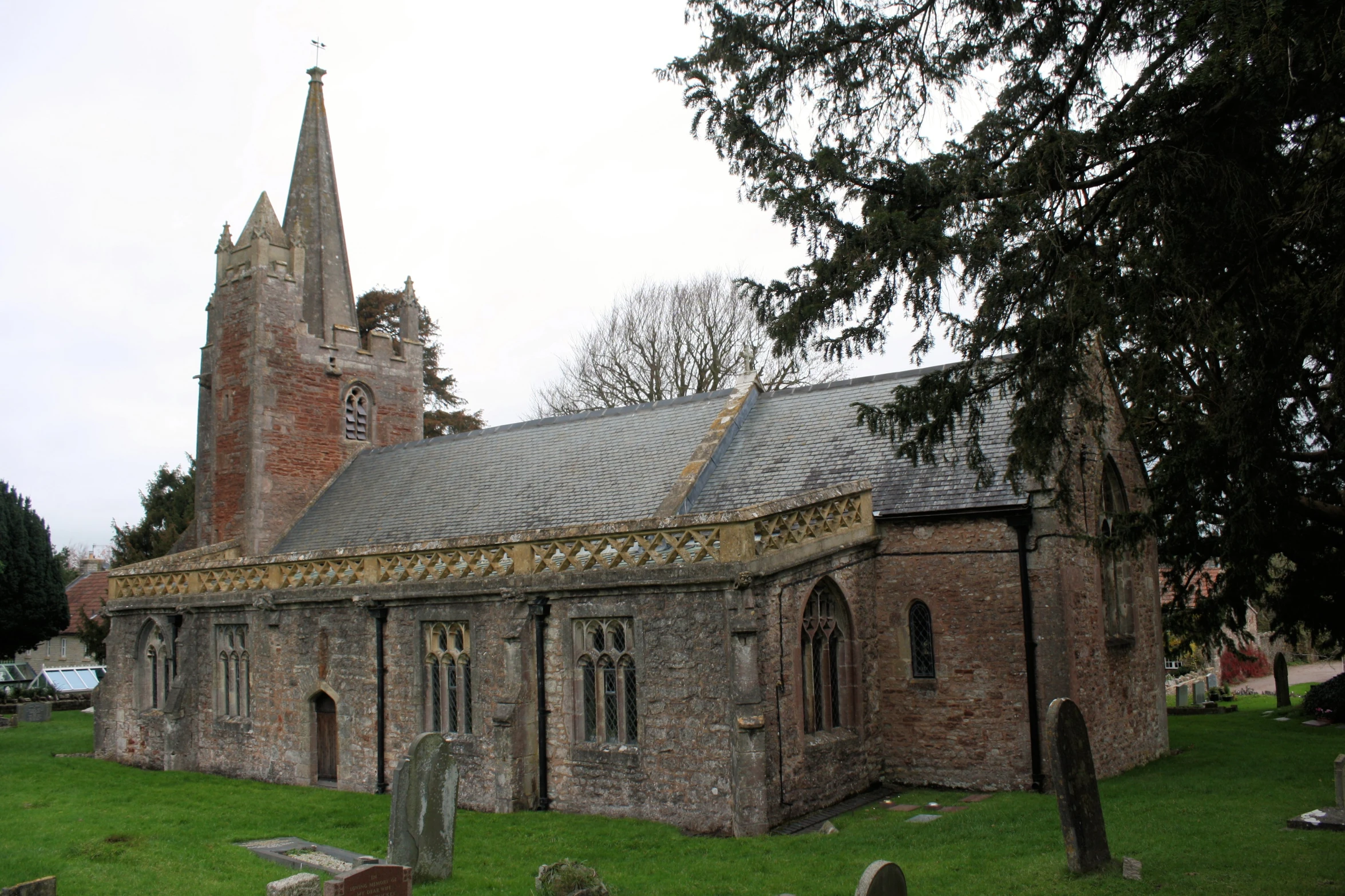 a church on the corner of an old cemetery