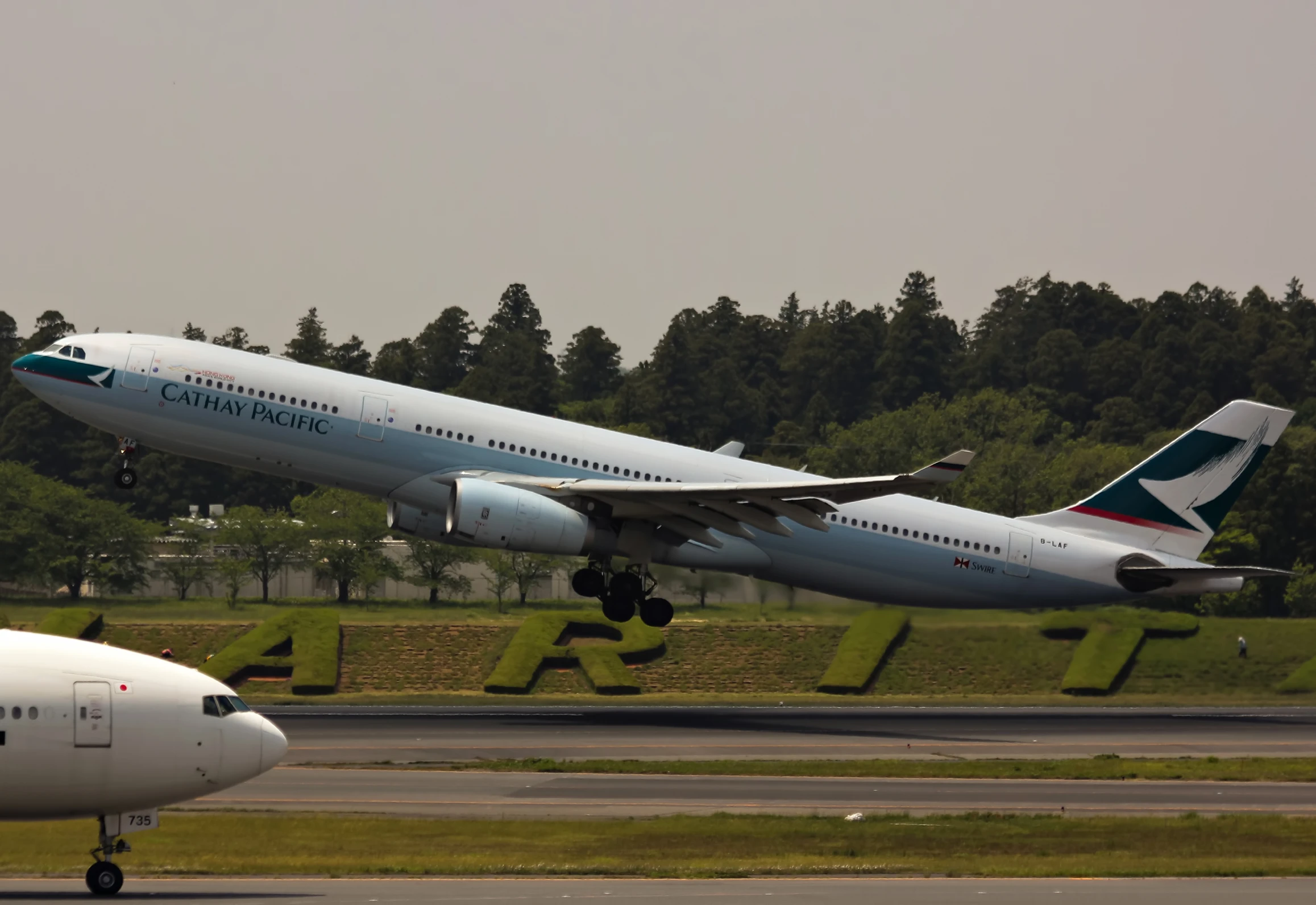 an airplane that is sitting on the runway