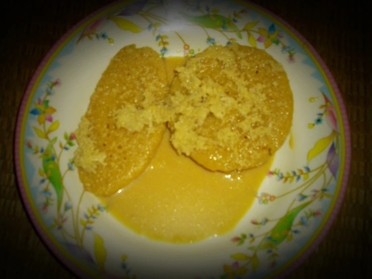 two small desserts are sitting on the plate