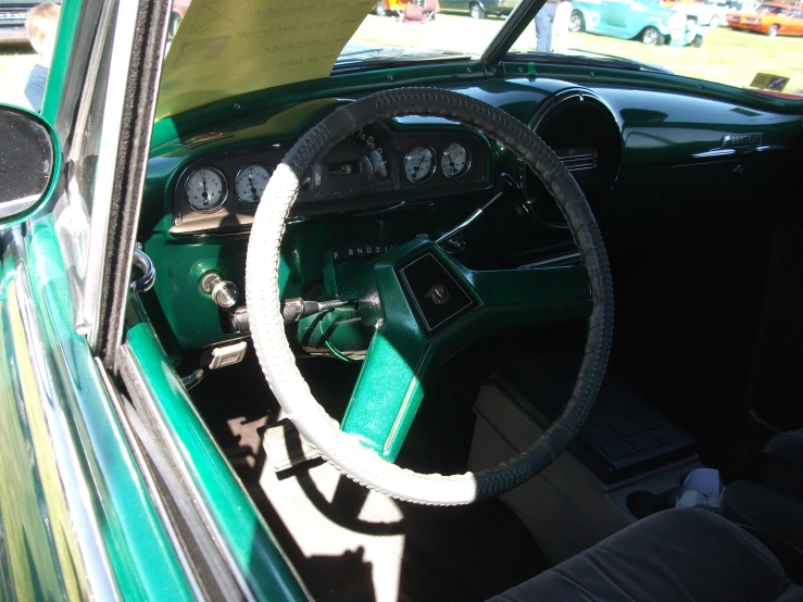an image of a car interior with the steering wheel in position