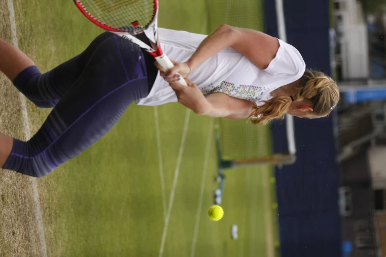 a tennis player is waiting for the ball to be hit