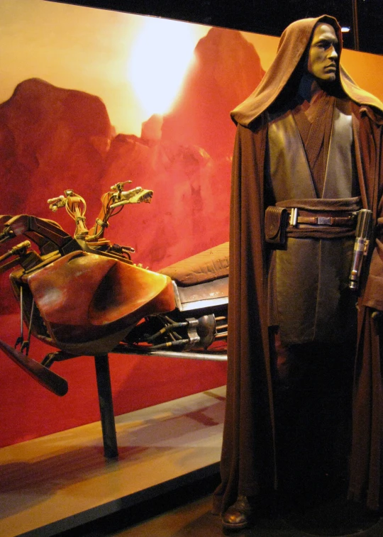 a statue of darth vader in a star wars exhibit