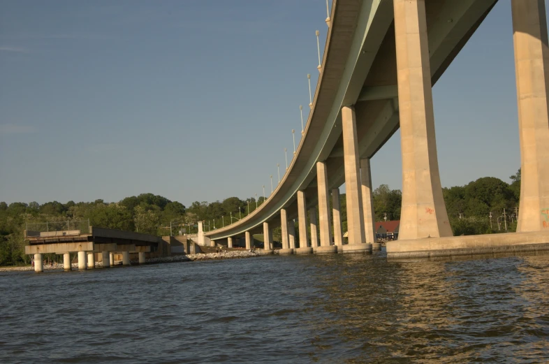 a long bridge over a river with water underneath