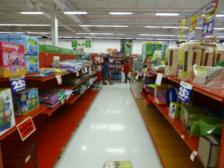 a room filled with lots of store shelves and piles of boxes