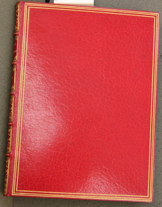 the red book is opened on a counter