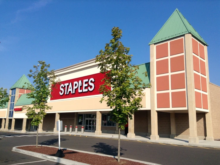 an empty street is in front of a store