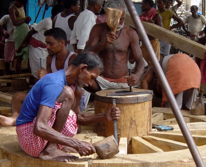 some men working together on a project in progress