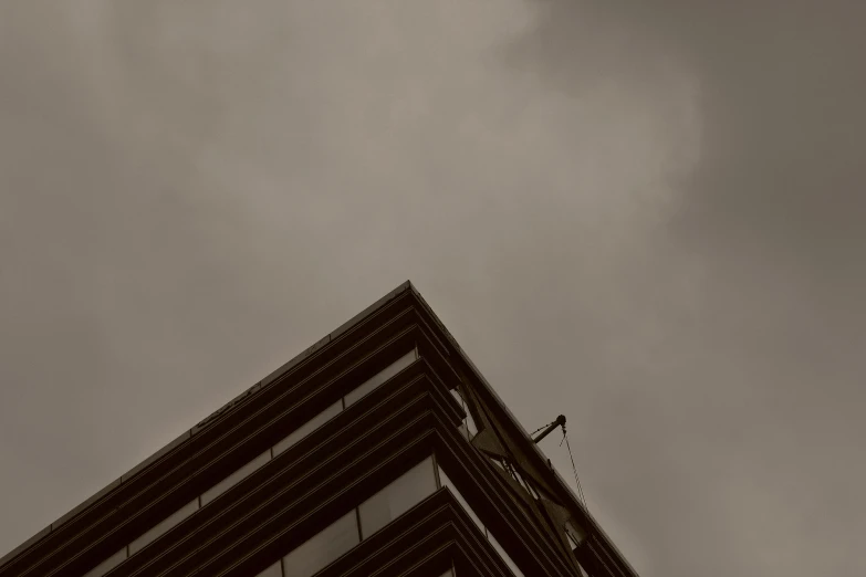 an image of a very tall building with sky in the background