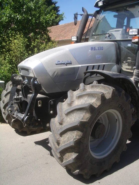 a tractor that is parked on the street