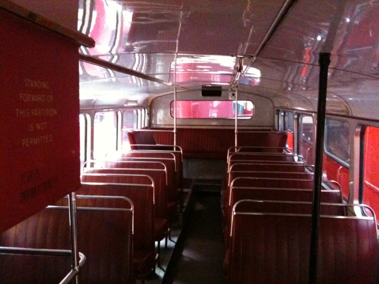 an empty train car is sitting empty in the evening