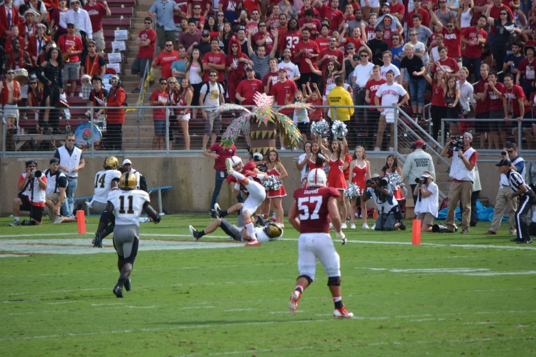 a group of players playing in a football game